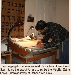 Rabbi Kevin Hale laying out the Megillat Esther scroll